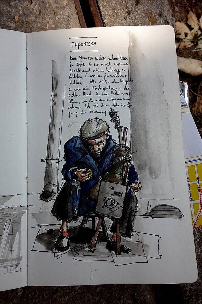 Drawing of an old man begging in the street